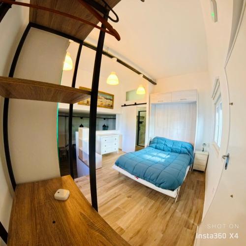 a bedroom with a bunk bed in a room at Loft A Mariña Lucense in San Ciprián
