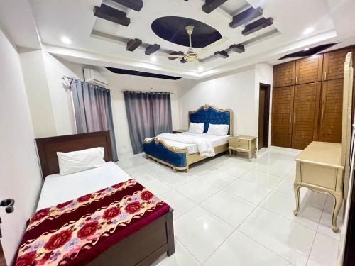 Postel nebo postele na pokoji v ubytování Luxury Apartment Guest House