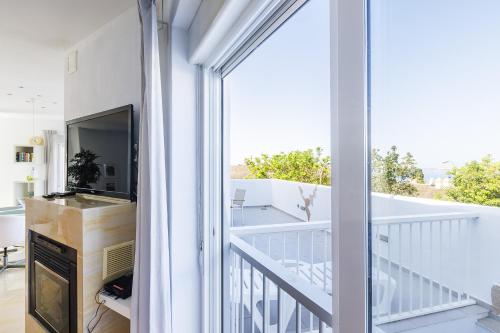 Postel nebo postele na pokoji v ubytování A&N Caleta de Velez Beach