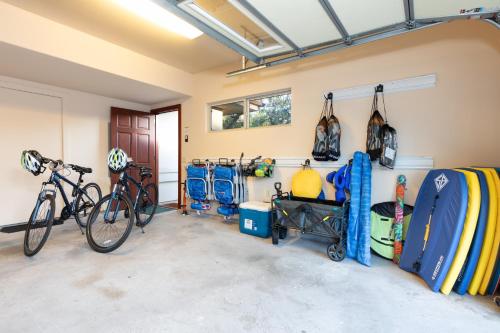 a garage with a bike parked in it at ❤PiH❤ Aloha Joes Ohana Close to Beaches and Restaurants in Waikoloa