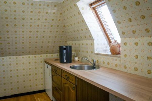 Dapur atau dapur kecil di Boardinghaus Perani