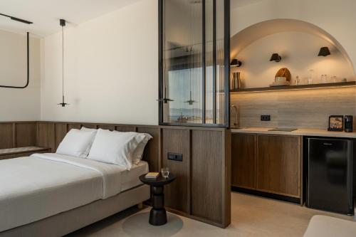 Η κουζίνα ή μικρή κουζίνα στο Thelèsi Apartments, 100m from the beach