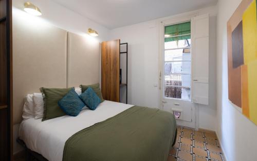 Postel nebo postele na pokoji v ubytování Stay U-nique Apartments Floridablanca