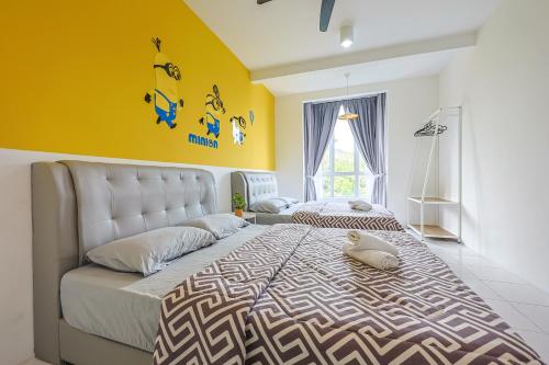 Ένα ή περισσότερα κρεβάτια σε δωμάτιο στο Family Adventure Homestay in Cameron Highlands Clover Home 6-30