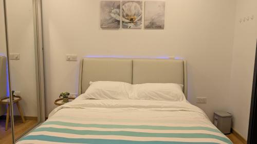 Ένα ή περισσότερα κρεβάτια σε δωμάτιο στο Luxury 3BR Apartment with Infinity Pool, Balcony n Gym