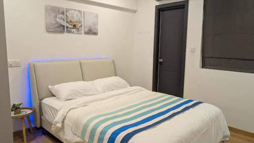Ένα ή περισσότερα κρεβάτια σε δωμάτιο στο Luxury 3BR Apartment with Infinity Pool, Balcony n Gym