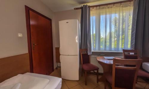 Un pat sau paturi într-o cameră la City Hostel