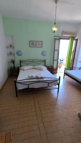 a bedroom with a bed in a room at Villa Orizontes in Spetses