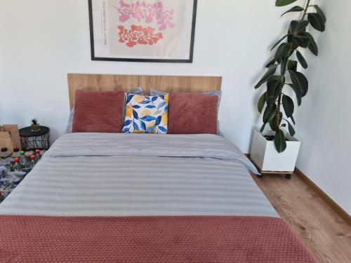 Postel nebo postele na pokoji v ubytování La Maisonette