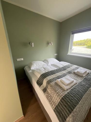 Cama o camas de una habitación en Hotel Hafnarfjall