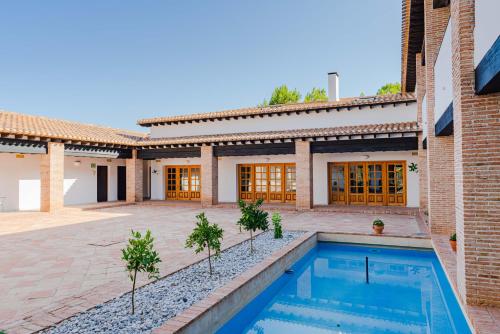 Πισίνα στο ή κοντά στο Hotel Rural La Alcanacia