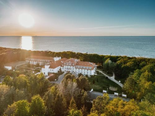 an aerial view of a large house on the ocean at IFA Graal-Müritz Hotel & Spa in Graal-Müritz