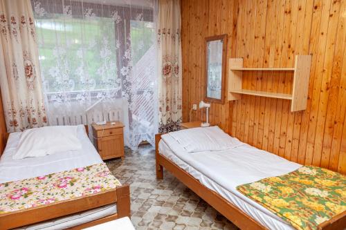 Postel nebo postele na pokoji v ubytování Dom Gościnny