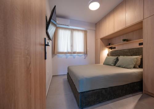 Katil atau katil-katil dalam bilik di Elysia Apartment