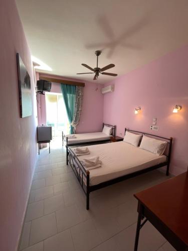 Katil atau katil-katil dalam bilik di Leon hotelApart