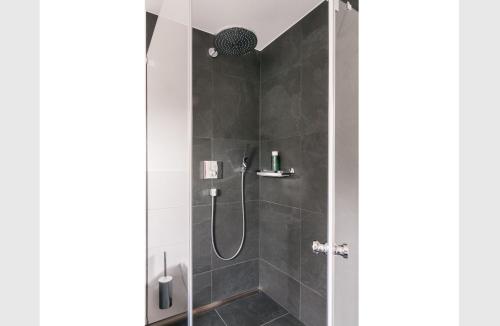 Ένα μπάνιο στο Ferienwohnung RottachSuite