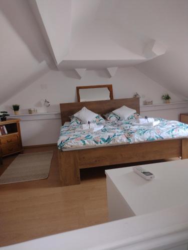 a bedroom with a bed in a room at Apartment ANGELOVE in Senj