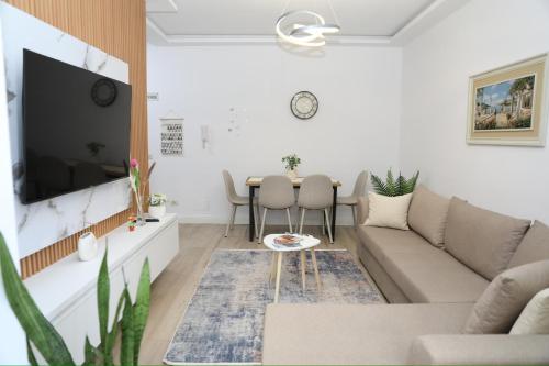 Cosmos Apartmentにあるテレビまたはエンターテインメントセンター