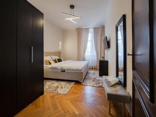 Postel nebo postele na pokoji v ubytování Mistic Apartament