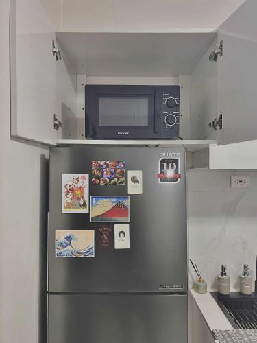 Kuchyň nebo kuchyňský kout v ubytování The Urban Apartment Fairy