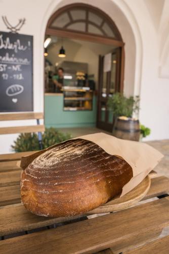 a loaf of bread sitting on top of a table at Vlaštovčí dům in Nové Město nad Metují