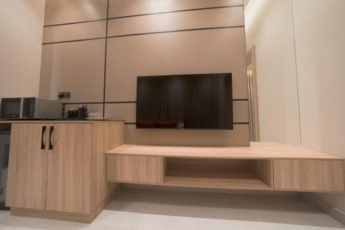 Kuchyň nebo kuchyňský kout v ubytování هاسيندا سويتس - Hacienda Suites