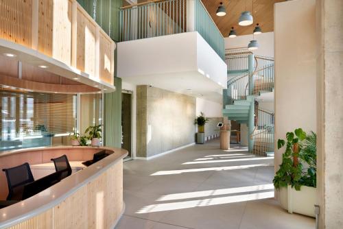 a lobby of a building with a staircase at For Students Only - Student Castle in Brighton in Brighton & Hove