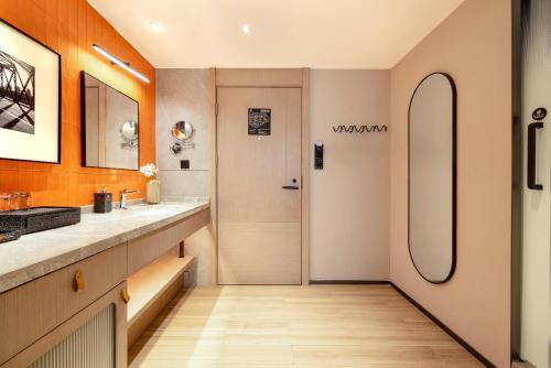 Koupelna v ubytování Huandong Manyi Hotel