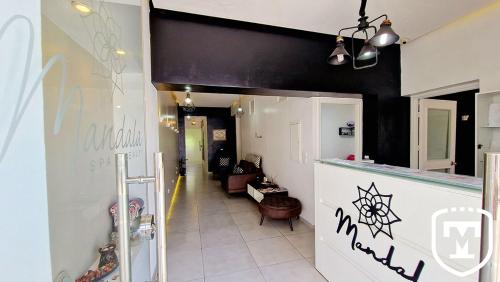 a room with a counter with graffiti on the wall at Hotel La Residence Hammamet in Hammamet