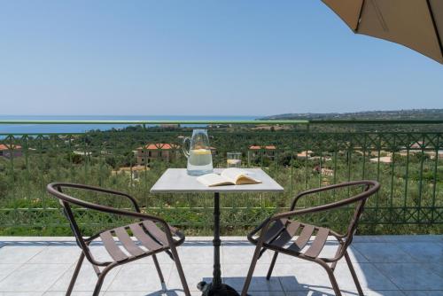Gambar di galeri bagi Captain's Apartments in Olive Grove 2 di Mousata