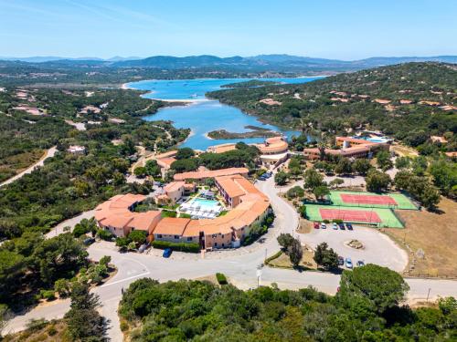 an aerial view of the resort and the river at Felix Hotels - Residence Hotel Costa Serena in Palau