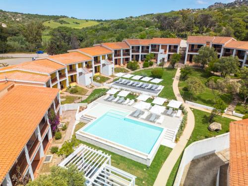 an aerial view of a resort with a swimming pool at Felix Hotels - Residence Hotel Costa Serena in Palau