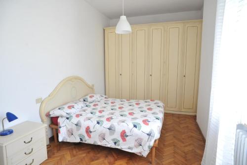 Postel nebo postele na pokoji v ubytování Relax a Camaiore Casa con Jacuzzi e Giardino