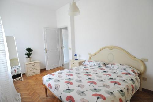 Postel nebo postele na pokoji v ubytování Relax a Camaiore Casa con Jacuzzi e Giardino