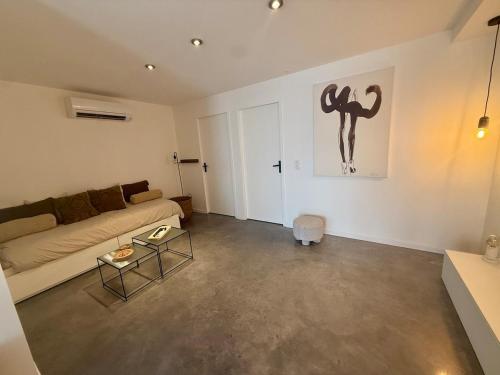 Posezení v ubytování Appartement en rez-de-jardin