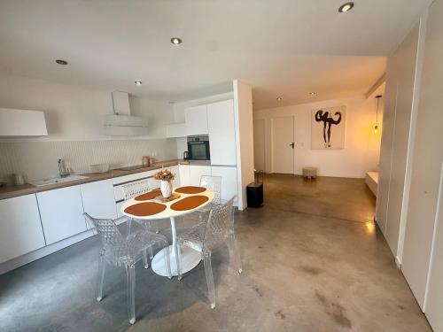 Kuchyň nebo kuchyňský kout v ubytování Appartement en rez-de-jardin