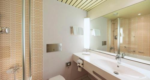 Ένα μπάνιο στο The Q - Quadro City Hotel