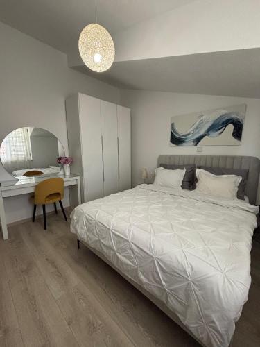Llit o llits en una habitació de Apartments Roko