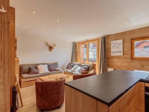 Chalet lumineux avec 4 chambres et parking à La Plagne