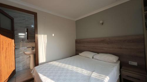 Katil atau katil-katil dalam bilik di Mut apart hotel