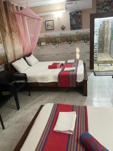Cama o camas de una habitación en Joseph Family Villa