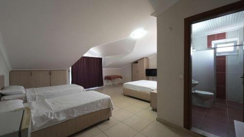 Katil atau katil-katil dalam bilik di Mut apart hotel