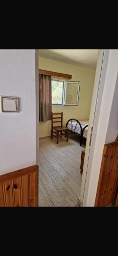 a view of a living room with a bench and a table at Silvana Room in Himare