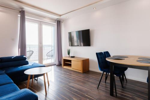 Televisyen dan/atau pusat hiburan di Sweda Apartments Gdańsk Seaside