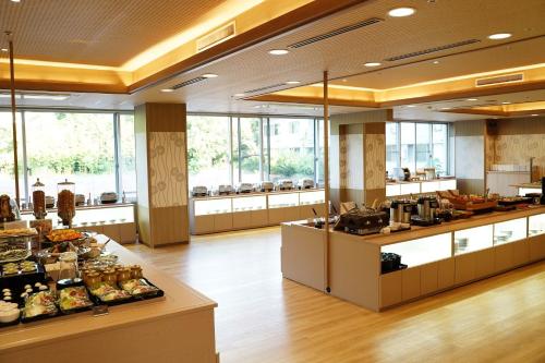 a restaurant with aasteryasteryasteryasteryasteryasteryasteryasteryasteryasteryasteryastery at LiVEMAX RESORT Kaga Yamashiro in Kaga