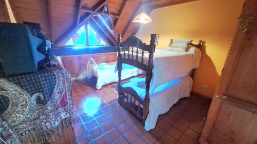 Postel nebo postele na pokoji v ubytování Casa Aguileña