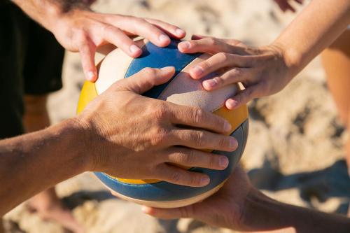 a group of people holding a beach ball at Holiday Inn - the niu, Fury Aschheim Messe by IHG in Aschheim