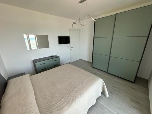 Postel nebo postele na pokoji v ubytování La Bella Vista