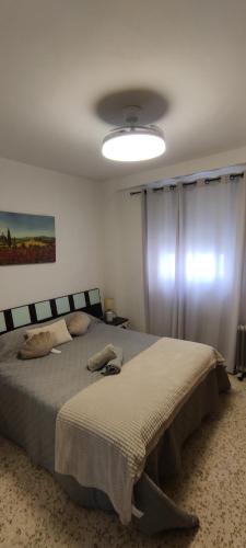 Ένα ή περισσότερα κρεβάτια σε δωμάτιο στο Vivir es Increíble