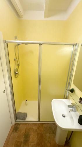 a bathroom with a shower and a sink at Residenze del Borgo in Zavattarello